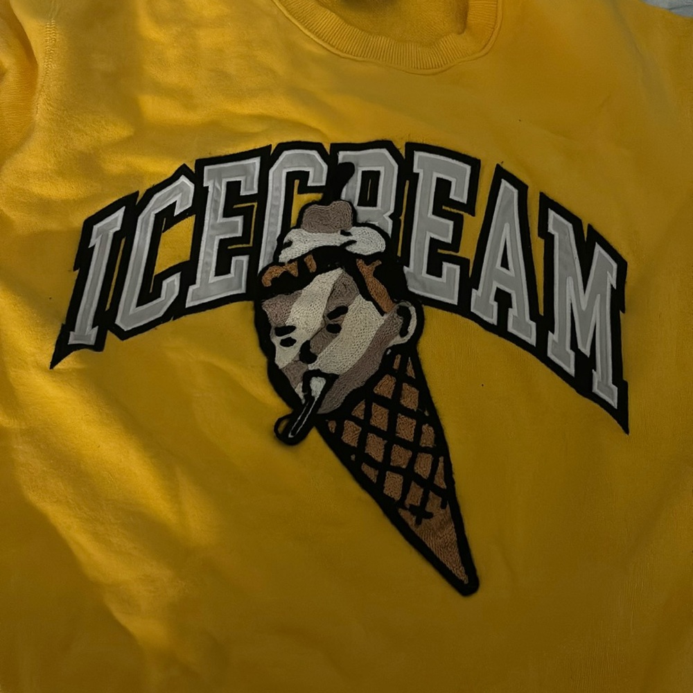 ICE CREAM SWEATER ! Got a detergent stain on it. FEEL FREE TO NEGOTIATE PRICE